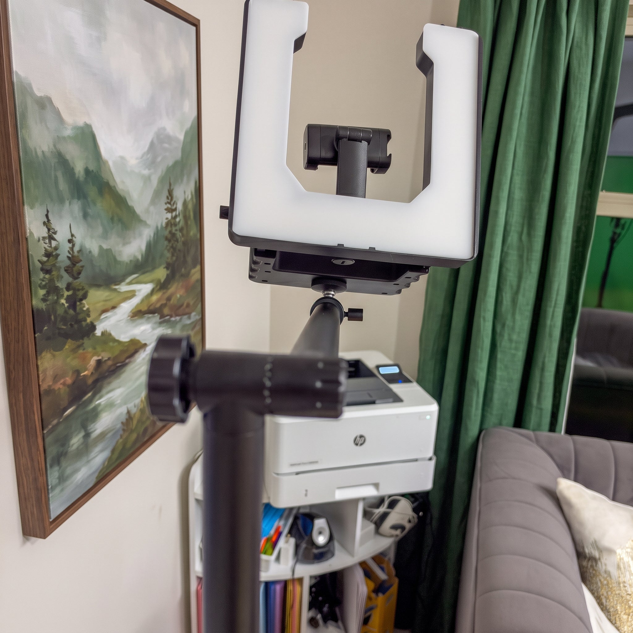 UltraLite mounted on the Creator Arm next to a desk