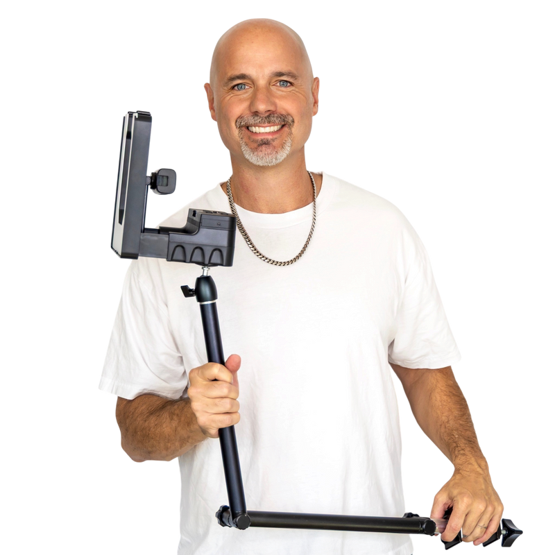 Justin McClure holding the Creator Arm with the UltraLite attached